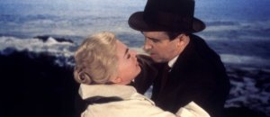 Vertigo 1958 007 00m ro9 scottie madeleine embrace in front of waves