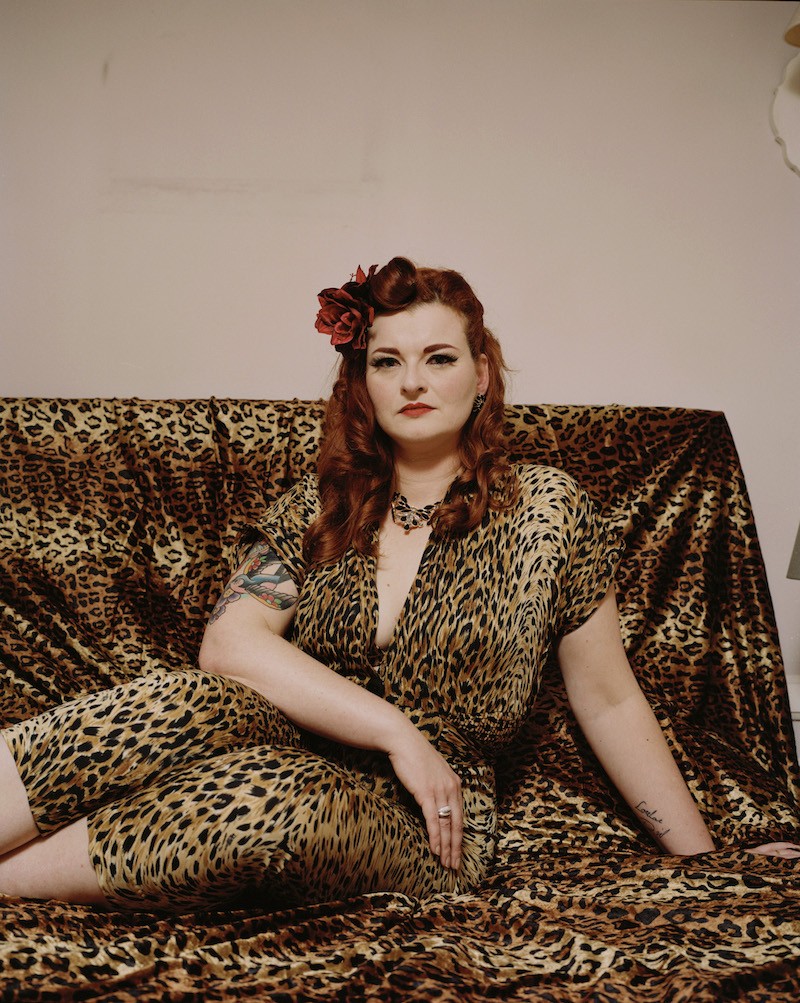 Magali likes to be photographed by her husband on improvised sets.