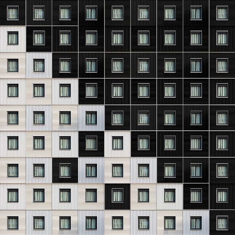 Le precisissime geometrie degli edifici nelle composizioni di Carlo Cafferini