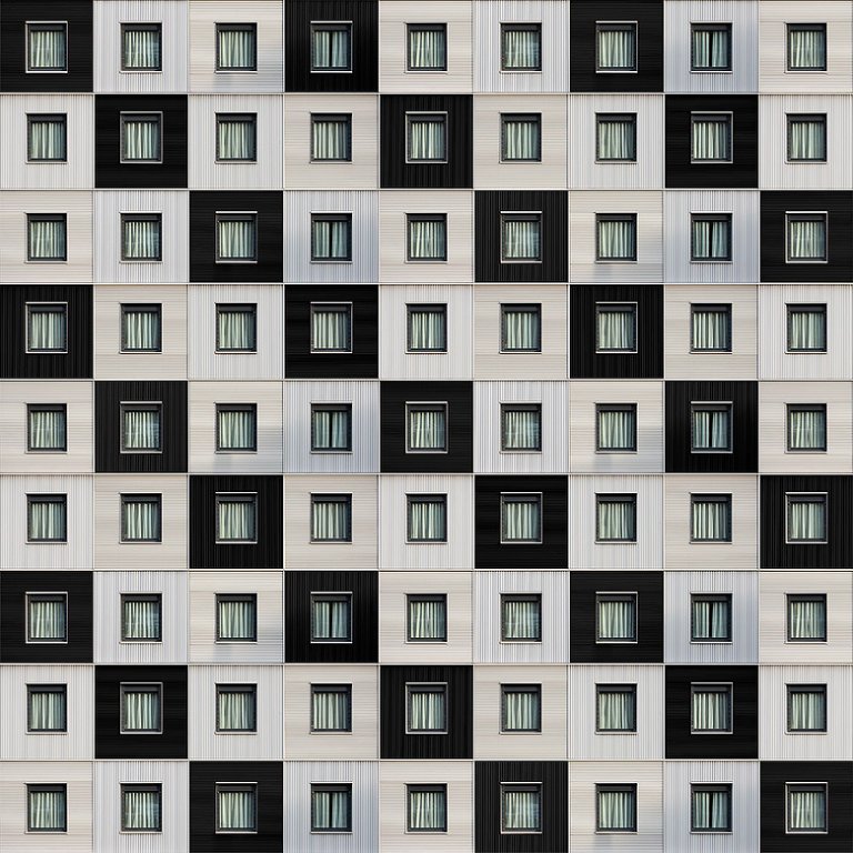 Le precisissime geometrie degli edifici nelle composizioni di Carlo Cafferini