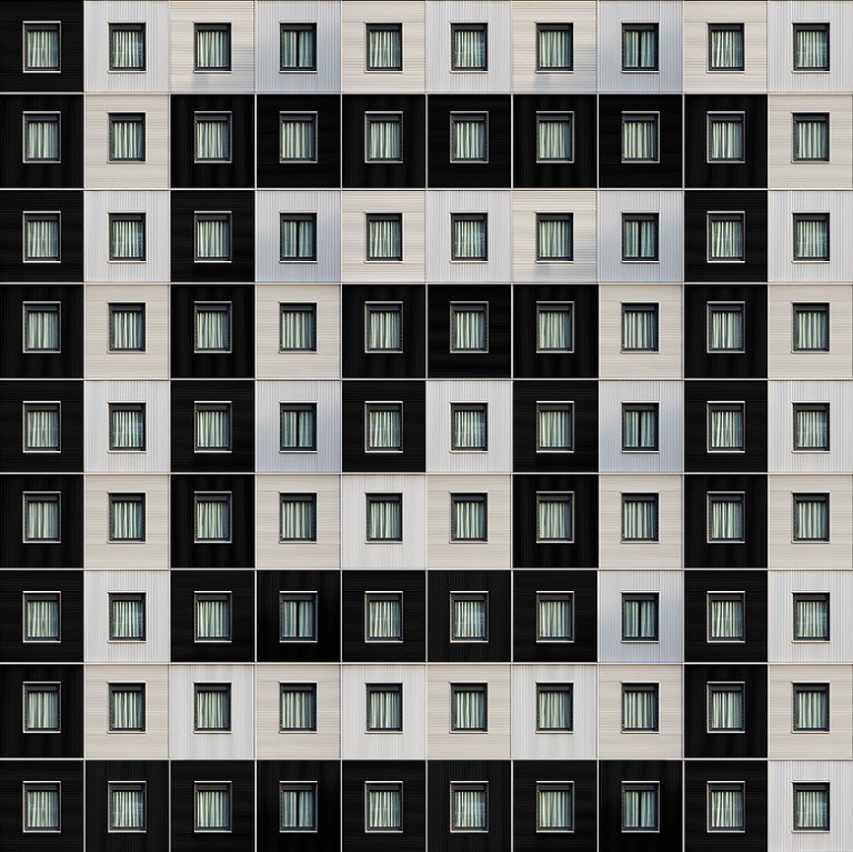 Le precisissime geometrie degli edifici nelle composizioni di Carlo Cafferini