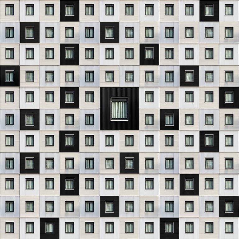 Le precisissime geometrie degli edifici nelle composizioni di Carlo Cafferini
