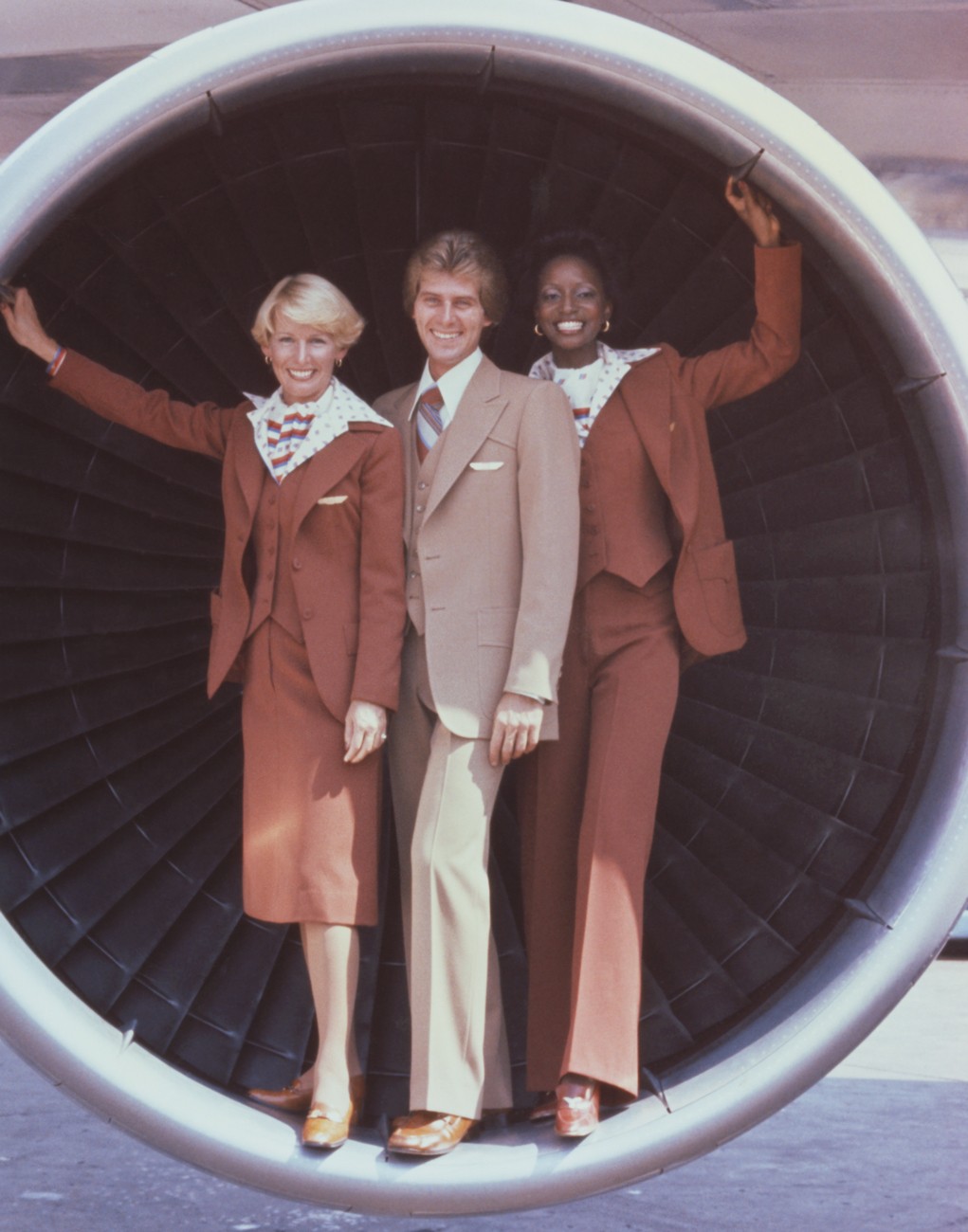 United Airlines flight attendants in uniforms by Stan Herman  1976 Photo credit: United Airlines Archive