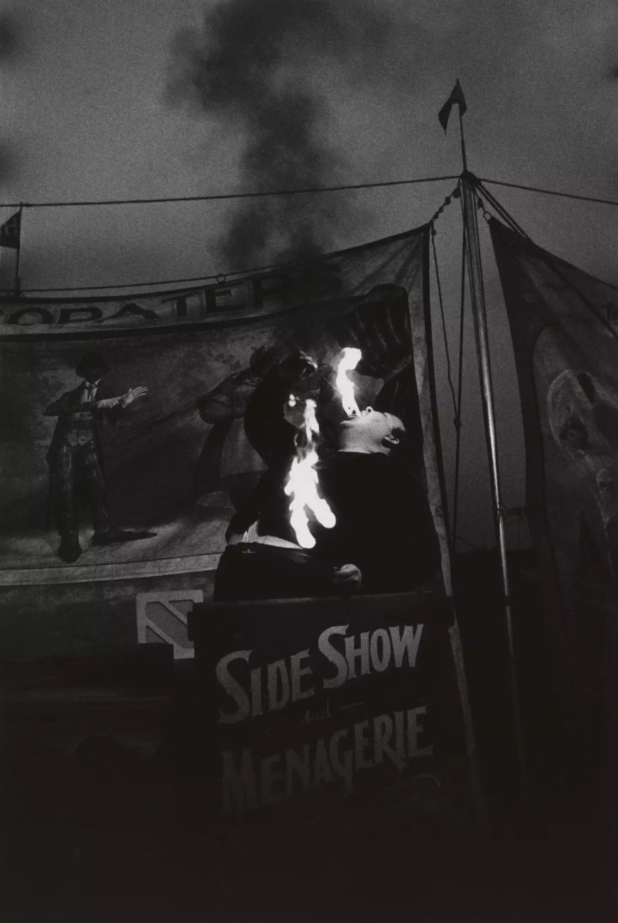 Fire Eater at a carnival, Palisades Park, NJ, 1957  © The Estate of Diane Arbus LLC
