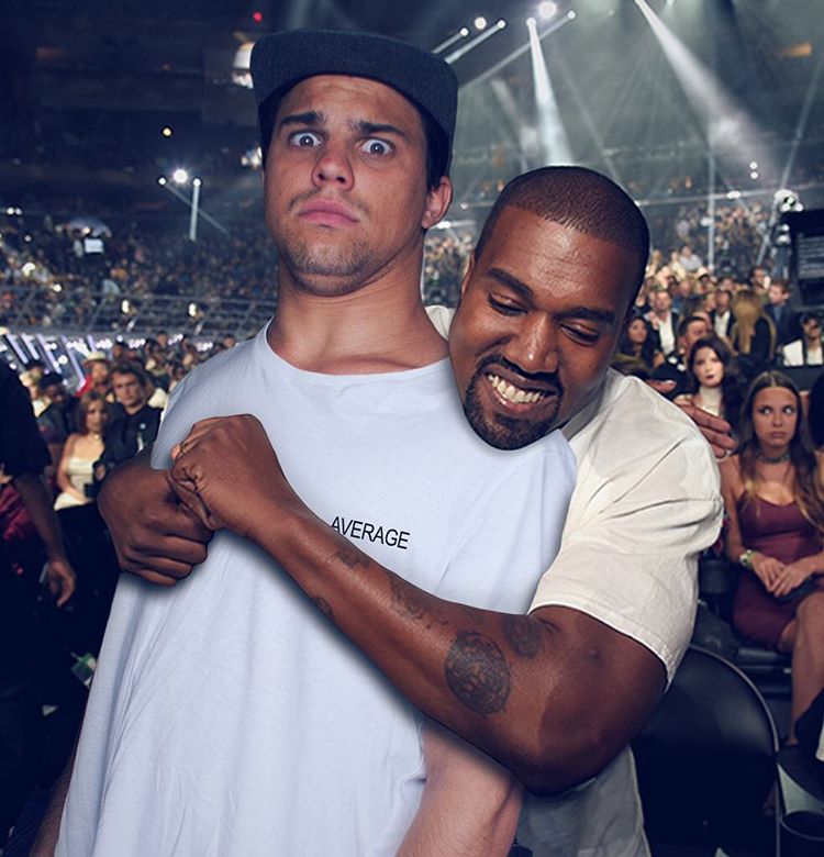 A disagio mentre viene abbracciato da Kanye West