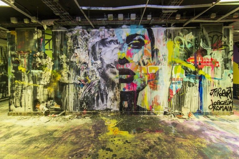 100 graffiti sui muri di un edificio scolastico a Parigi