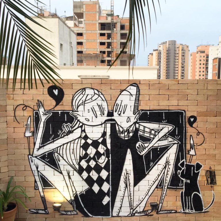 La romantica street art di Alex Senna fatta di abbracci e cuori