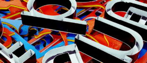 Gray alphabet cutout decor