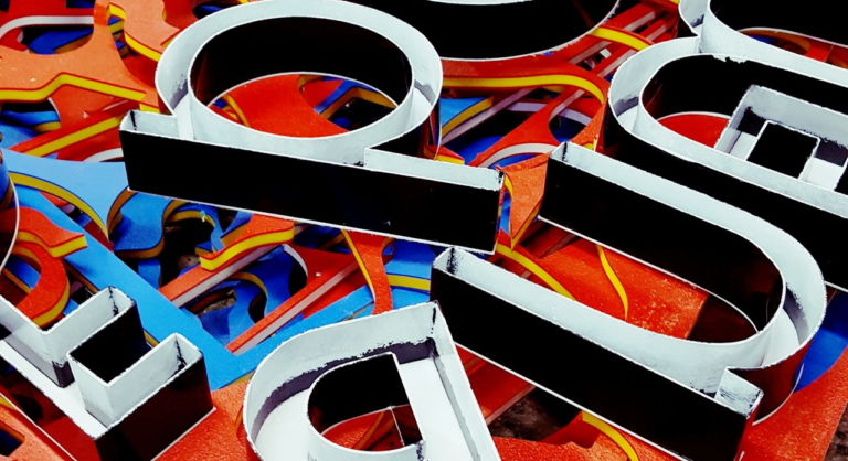 Gray alphabet cutout decor